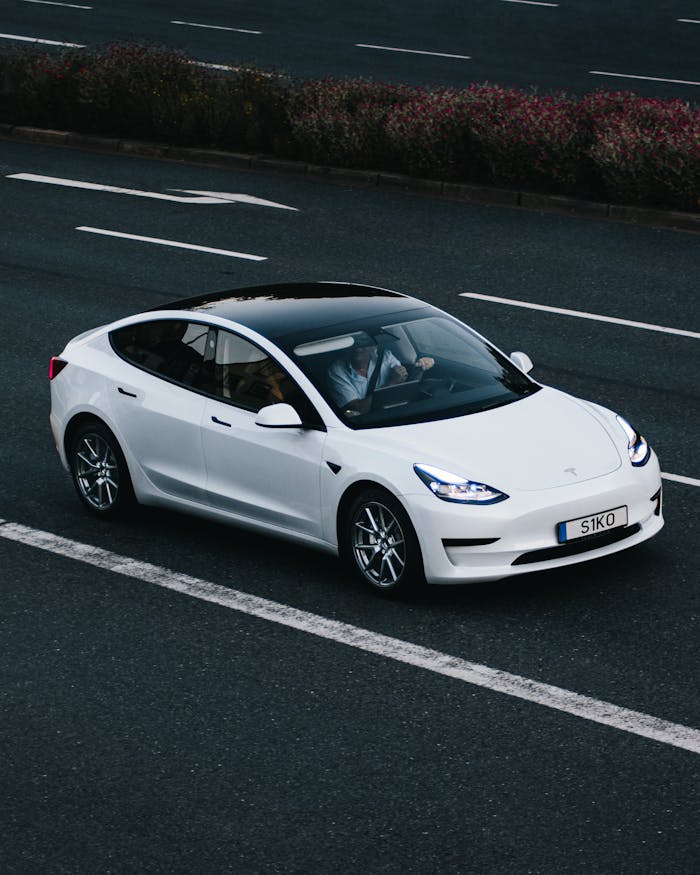 pexels-photo-9300916 White Tesla Model 3 Car on Road
